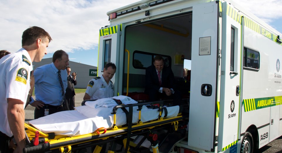 Prime Minister John Key inside a St John ambulance bought with Appeal funds St John PM inside ambulance.jpg